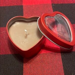 Heart-Shaped Red Candle Tin. Chocolate scented.